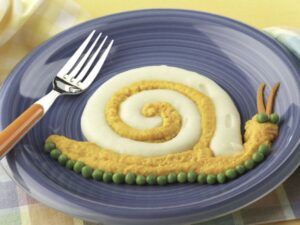 Haz platos elaborados y divertidos para que los niños disfrute. platos de los niños. Caracol